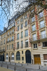 Obraz premium Paris, place Dauphine, beautiful place and public square, ancient buildings 