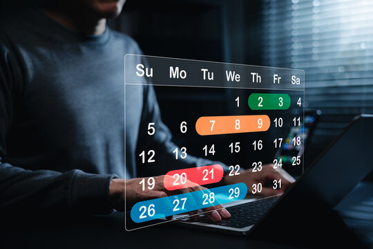 Schedule Planning and Calendar Management Concept. Man using laptop with virtual calendar. task scheduling, date planning, deadline tracking, time management, appointment reminder, work productivity