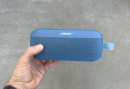 Bose Portable Bluetooth Speaker Held In Hand Outdoors