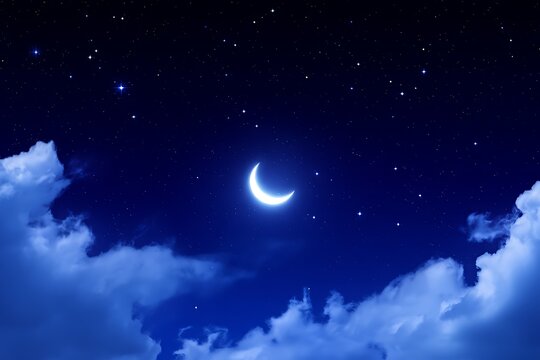 Night sky with moon and stars above clouds.