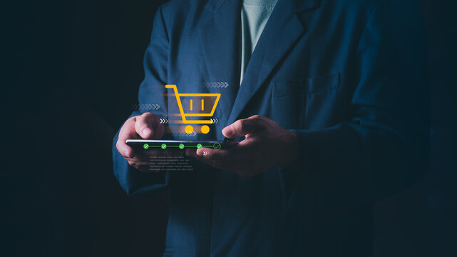 Businessman using smartphone for online shopping with digital cart and progress bar. Concept of fast e-commerce transactions, mobile retail, and seamless digital payment checkout process.