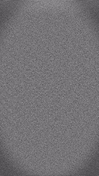 Vertical retro static television pattern with turn on off animation on black background. tv static noise glitch screen. 4k interference signal bad animation