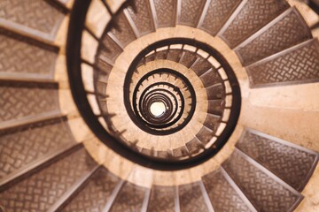 Obraz premium Paris, France - March 9, 2026: Circular stairs or caracole in Paris 