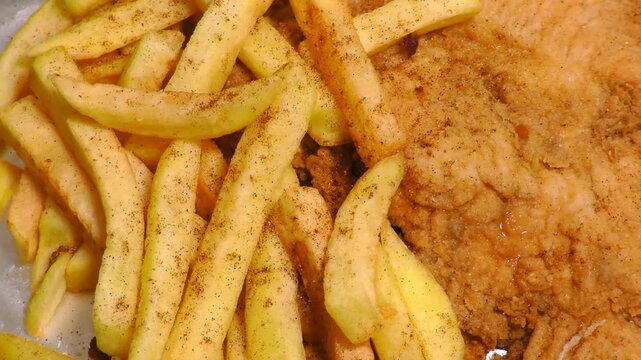 Papas a la francesa con chuleta