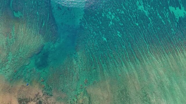 Top View of Turquoise Shallow Sea with Natural Sand and Water Patterns