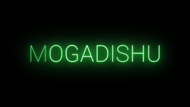 Flickering neon green glowing mogadishu sign animated on black background