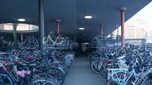Navigating a large multi-story bicycle parking garage in the city