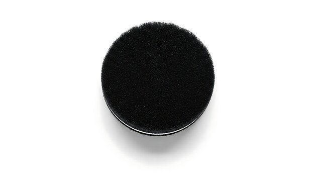 Overhead shot of a bowl filled with dark liquid on white.