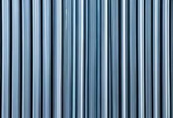 Obraz premium Vertical Lines of Blue Glass and Aluminum Building Facade