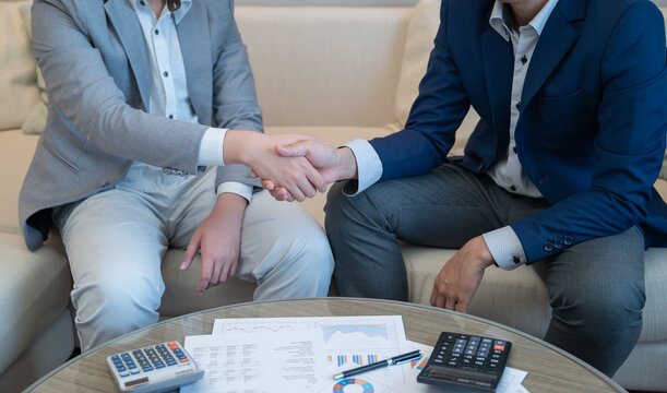 Businessperson make Business Agreements with Business Partnerships for Wealth Management and Risk Management Corporate Finance.