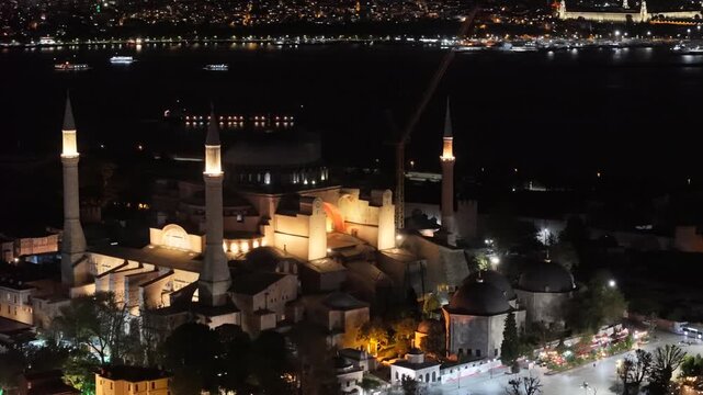 Nighttime orbital aerial shot of Hagia Sophia (Ayasofya) Grand Mosque in Istanbul, Turkey.
