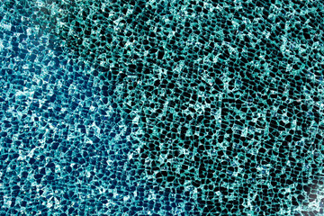 Obraz premium Glass broken background with irregular cracked texture. Broken glass surface with sharp edges and damage detail. Glass broken pattern with mosaic structure and shards. Broken glass texture .