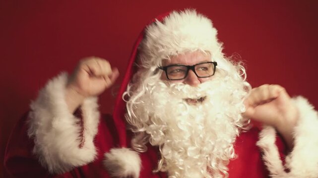 Santa Claus is dancing and having fun