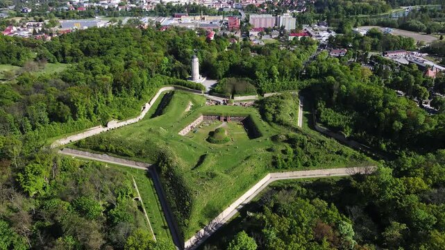 Aerial view of historic Prusy Fort surrounded by forest and urban area in Nysa Poland. Concept of military architecture cultural heritage and travel destination