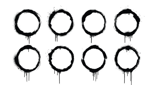 Set of black spray paint circles with drips and splatters