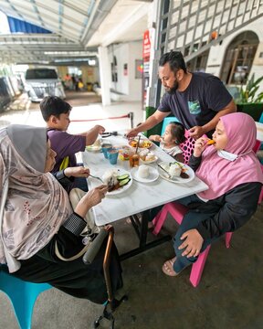 Malaysia, Pahang - October 20, 2022 Customer at Opah Strawberries and jams a bakery in Cameron Highlands.