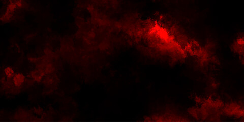Fototapeta premium Abstract grunge red and black powder explosion cloud on black background. dark red smoke Like cloud wave effect on black. dark fire flame grunge texture background. toned fiery red sky. 