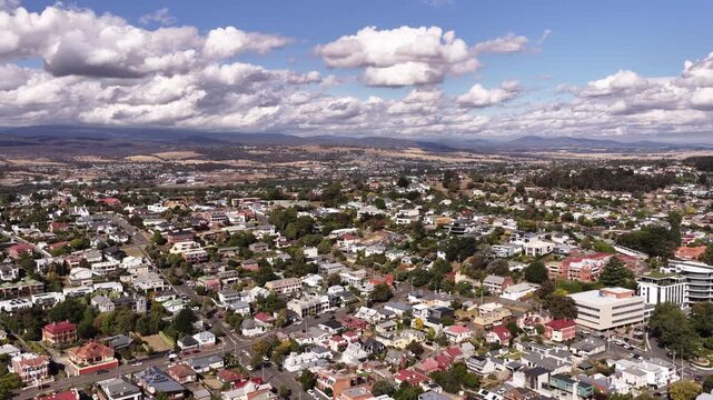 Town to river aerial panoramic view over Launceston city in Tasmania &ndash; valley.