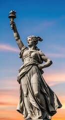 Fototapeta premium Statue of Liberty replica against a vibrant sunset sky, symbolizing freedom and hope.