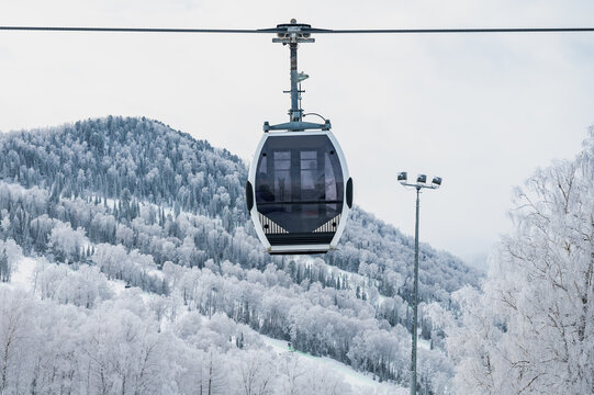 Ski Lift Gondola Over Snowy Mountains in Sheregesh