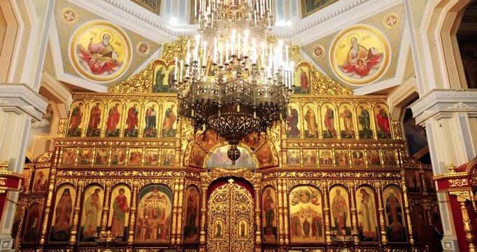 Cinematic Upward View of Chandelier in Orthodox Church