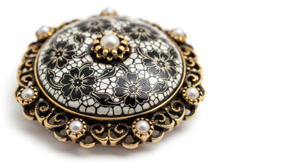 Naklejka premium Brooch with Black Floral Pattern and Pearl Accents on White Background