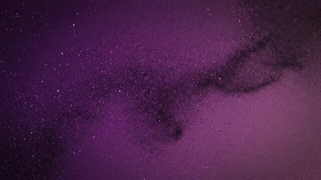 Abstract purple grainy gradient background featuring dark violet noisy texture and elegant grained surface for wide website banner header backdrop design in 4K resolution.