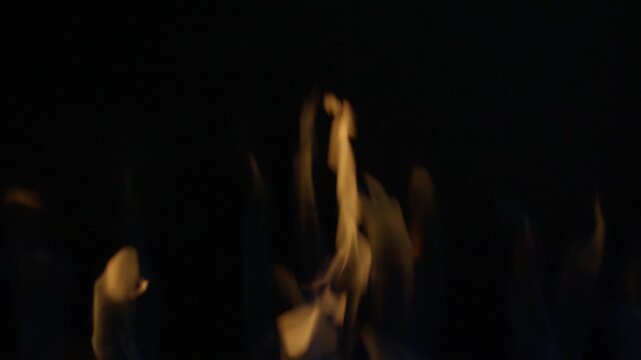 Close-Up of Gas Burner Flames on Black Background Under Cauldron for Pilaf