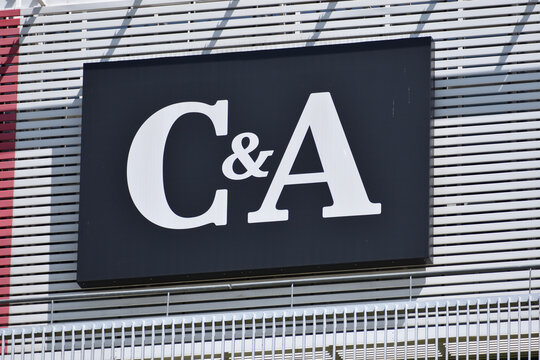 C and A (C&A) signage, logo, emblem on the fashion clothing store facade. WARSAW, POLAND - MAY 21, 2023
