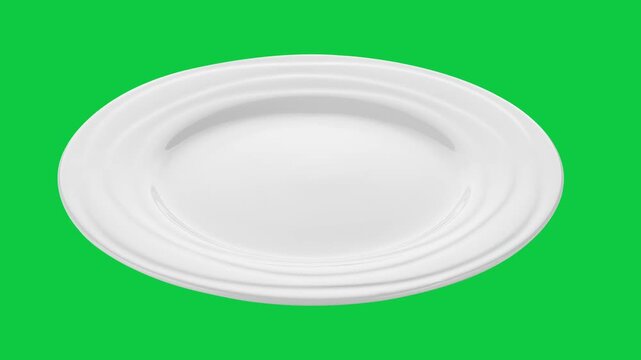 Empty plate isolated on green screen