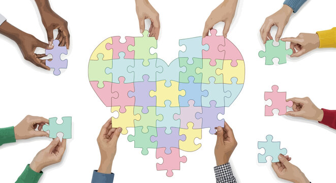 Diverse hands building heart puzzle.