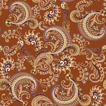 Vintage oriental paisley seamless pattern with ornate floral swirls and vector leaf ornaments for luxury textile wallpaper and tile decoration