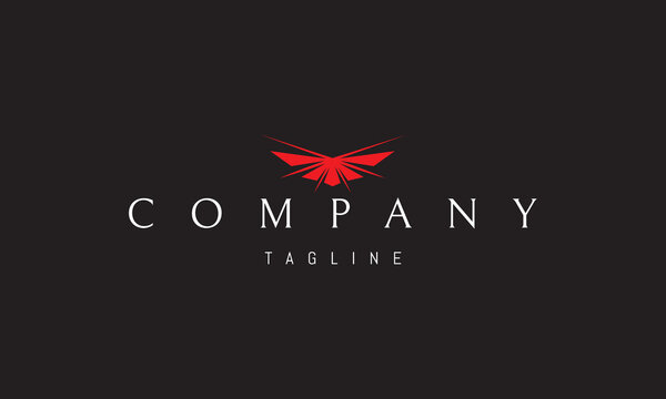 A vector red logo featuring an abstract image of a butterfly in rays of light symbolizing transformation, freedom, beauty and spiritual illumination.