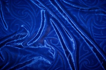 Fototapeta premium luxurious royal blue quilted velvet fabric texture with elegant diamond stitch folds