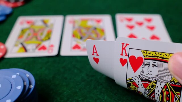 Royal Flush Combination Playing cards, casino gambling table closeup