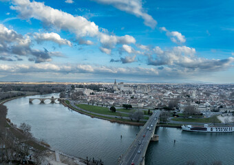 Fototapeta premium Avignon, France: Discover the Palais des Papes, the Iconic Saint-Bénézet Bridge, and the Ancient Ramparts of this Stunning UNESCO World Heritage City