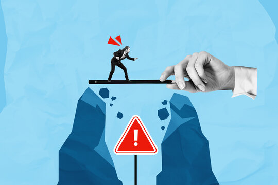 Businessman balancing on pencil over gap supported by giant hand