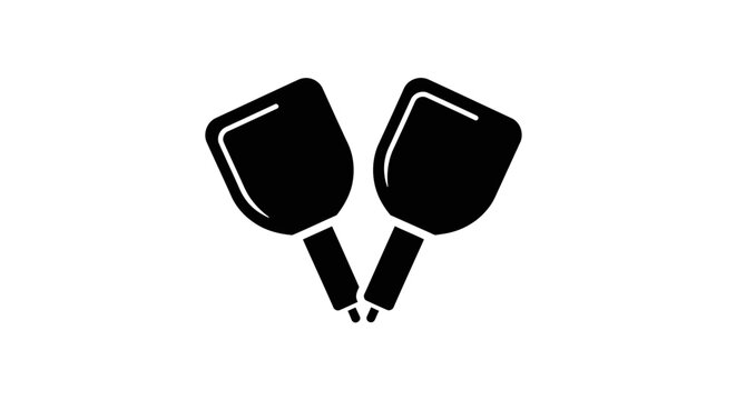 Black ping pong paddles crossed.