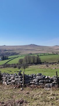 Merrivale Dartmoor Devon England UK. 20.03.2026. Video. Overview of Merrivale village and pub on western Dartmoor and a backdrop of hilltop Tors  a famous west country visitor attraction.