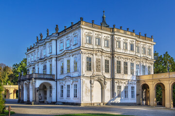 Obraz premium Ploskovice Castle, Czech Republic. Side view of Baroque palace facade under clear sky in bright daylight.