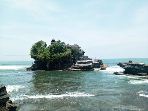 Greenish sea water in the Tropical Islands. Blue sky and clouds, Bali.