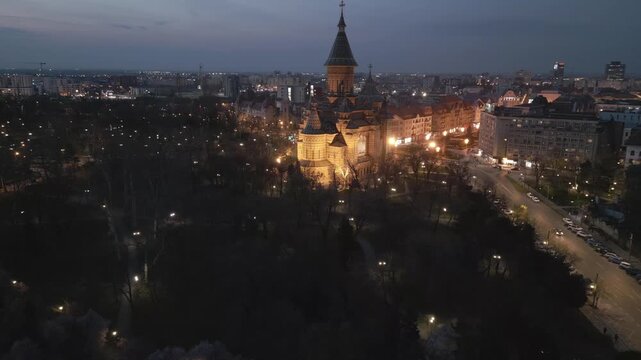 View of Timisoara city centre with the Orthodox Cathedral and Bega River on March 24, 2026, featuring urban architecture, flowing water, and a calm European atmosphere.