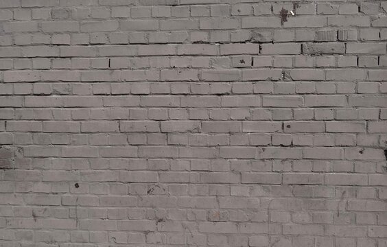 Close-up of White Brick Wall &ndash; Structural Masonry Detail. Light warm gray wall constructed using standard horizontal stretcher bond. Ideal for texture mapping in 3D modeling.