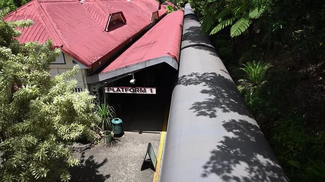 historic Kuranda railway station platform next to the Skyrail terminal in the rainforest of the mountains near Cairns, Queensland, travel destination in tropical Australia.