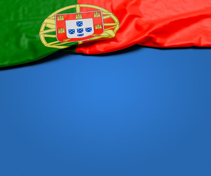 The wrinkled flag of Portugal draped onto a flat blue background with shadow. Copy space for message