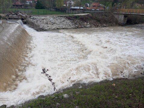 Dam on the river after rain