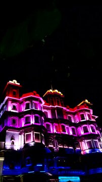  Rajwada Palace Indore illuminated with vibrant LED lights at night, Madhya Pradesh, India