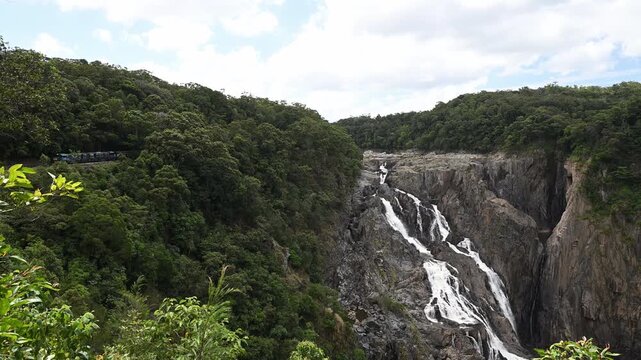 historic Kuranda railway station platform next to the Barron river falls and Skyrail in the rainforest of the mountains near Cairns, Queensland, travel destination in tropical Australia.