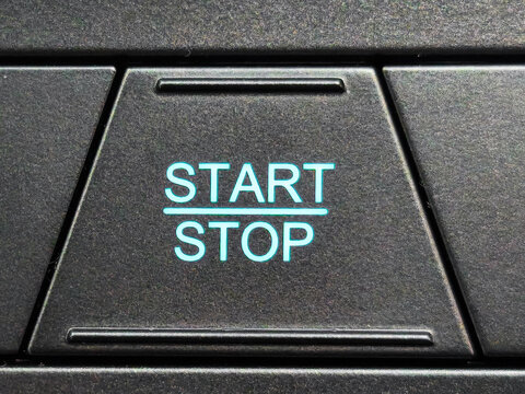 Modern Engine Start Stop Button on Luxury Car Dashboard Console