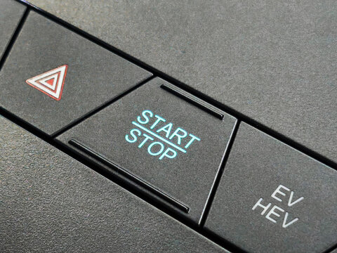 Modern Engine Start Stop Button on Luxury Car Dashboard Console